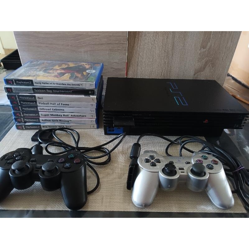 CONSOLE RETRO PS2, 2 MANETTES, 1 CARTE MEMOIRE ET 8 JEUX
