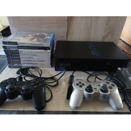 CONSOLE RETRO PS2, 2 MANETTES, 1 CARTE MEMOIRE ET 8 JEUX